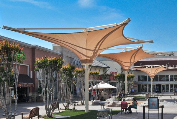 Preparing Your Property for Spring with Architectural Umbrellas